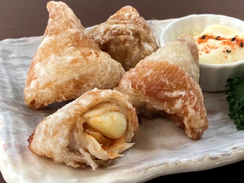 ニンニク丸ごと粒のまま、豚バラ肉で巻きました