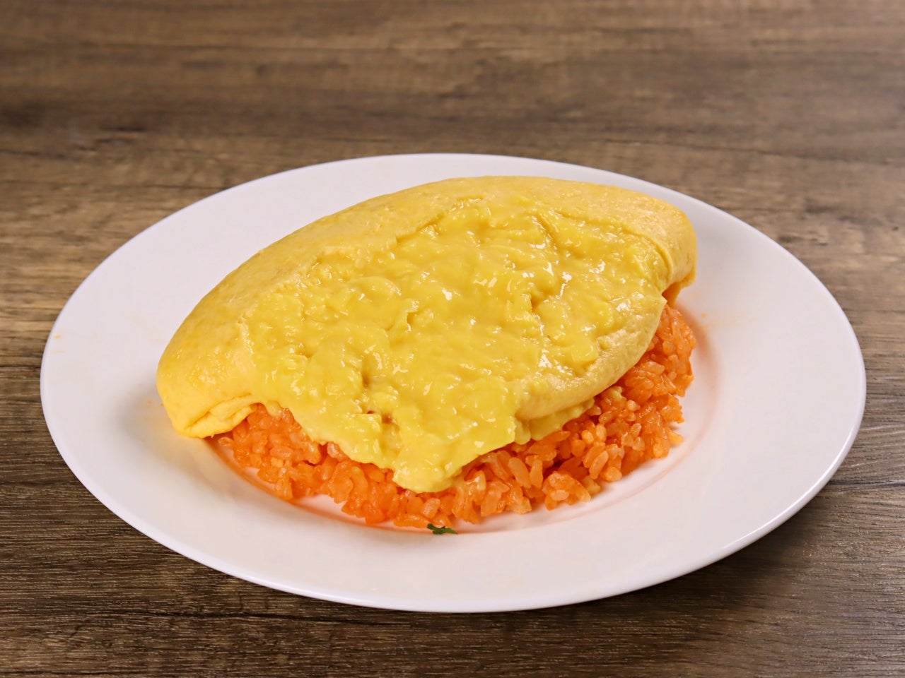 【オムレツ】 業務用 とろっと名人ひらけ！オムレツ 1個 冷凍｜業務用食品・食材や